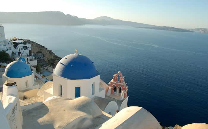 Blue domes of Santorini at dusk